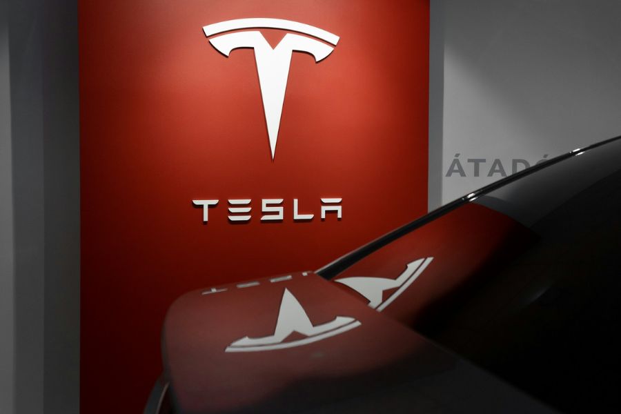 Tesla logo and a car